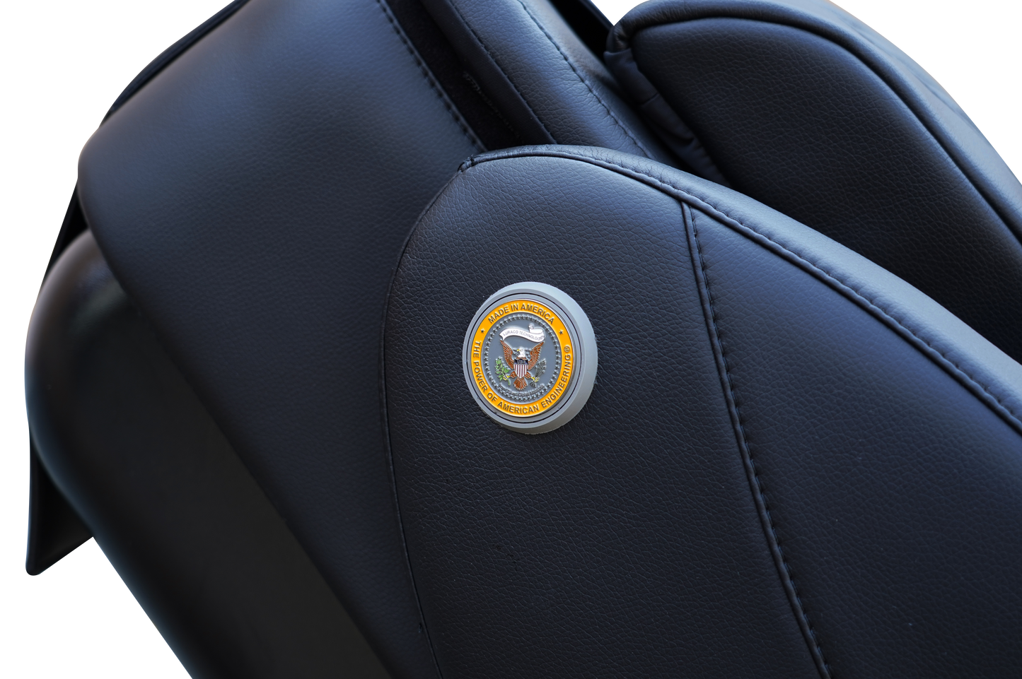 Close-up of Luraco iRobotics 9 Max Plus's sleek black armrest with an emblem.