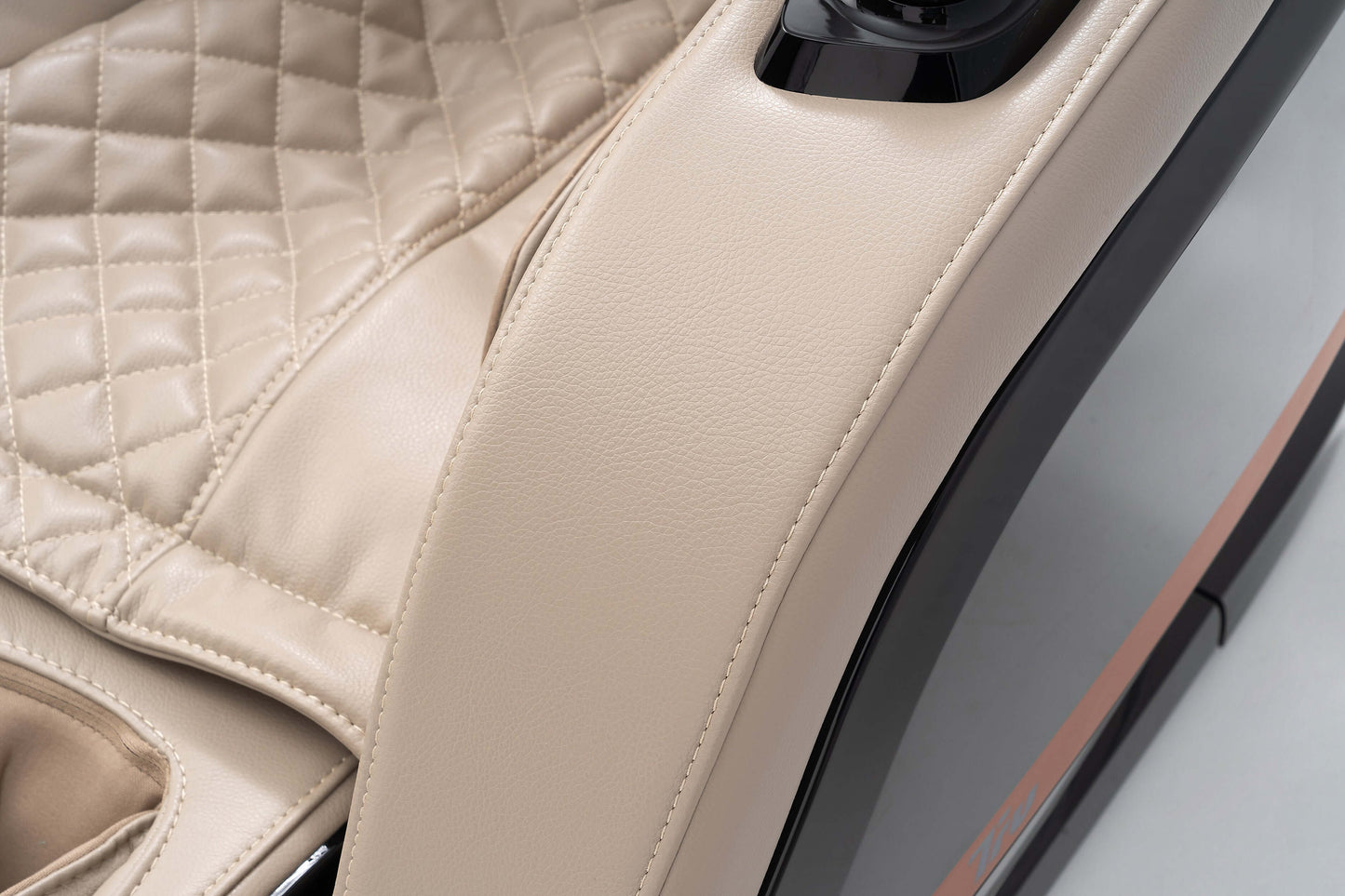 Close-up of the elegant cream-colored upholstery on the TRU Symphony Plus 4D Massage Chair.